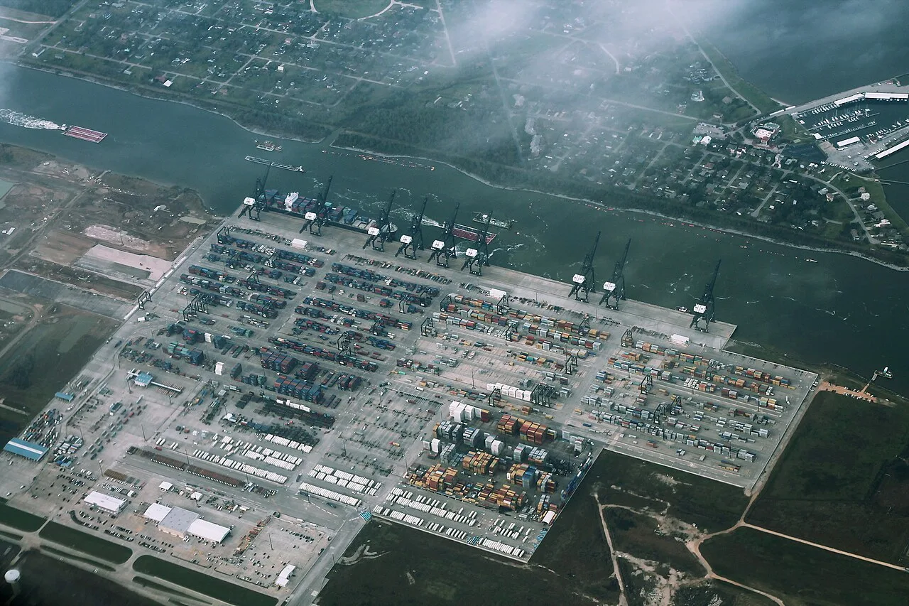 Aerial view of the Port Houston Bayport Container Terminal near Houston, with ship-to-shore cranes along the wharf, a vessel at berth and stacked containers across the yard
